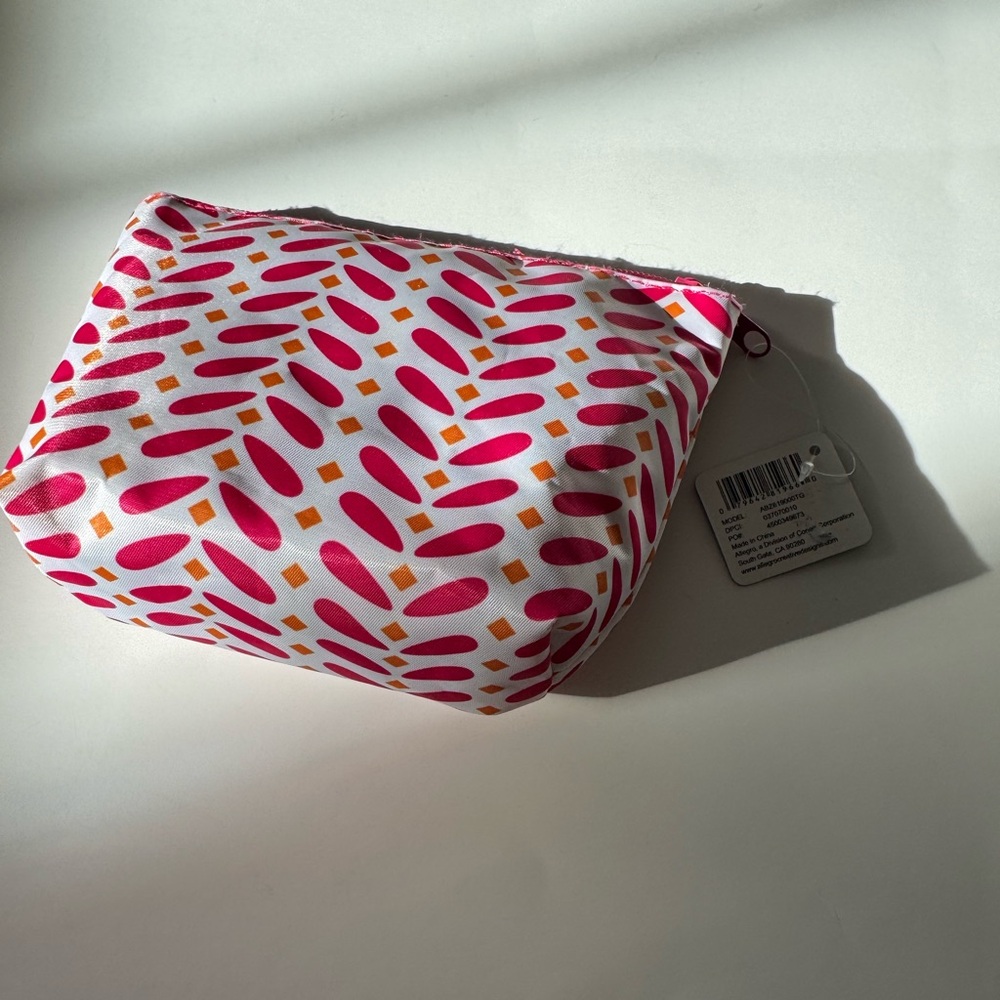 Basics  cosmetic pouch . Pink, orange and white . NWT .